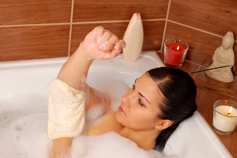 Woman relaxing in bath