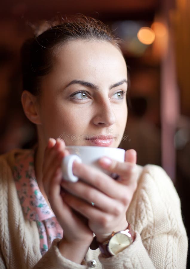 Woman relaxing in cafe