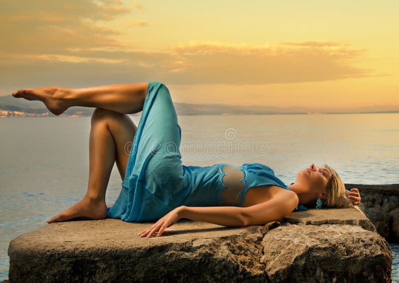 Woman relaxing near the sea