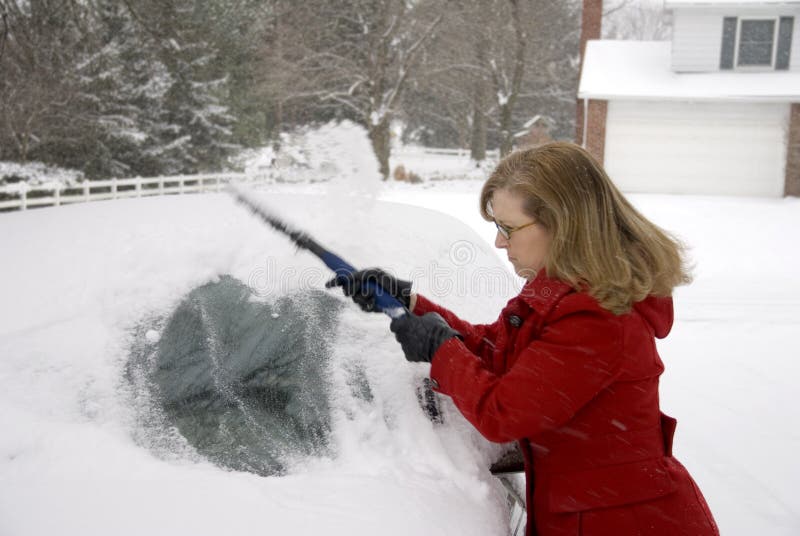 Woman Removing Snow From Car 5