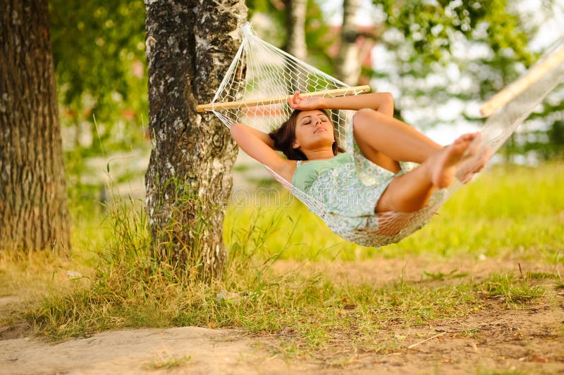 Woman rest in hammock royalty free stock photo Woman rest in hammock royalty free stock photo