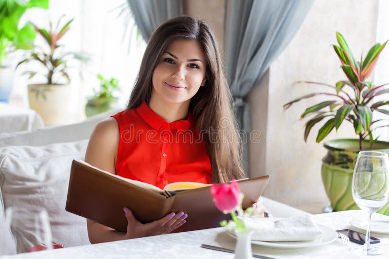 Woman in restaurant stock photos