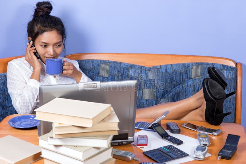 Woman resting with drink stock image