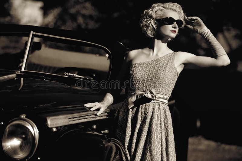 Woman and retro convertible
