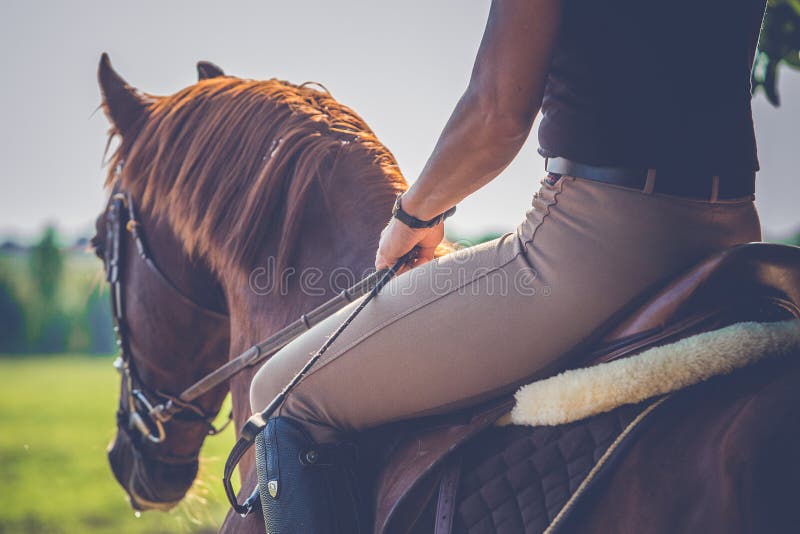 Woman riding on horse