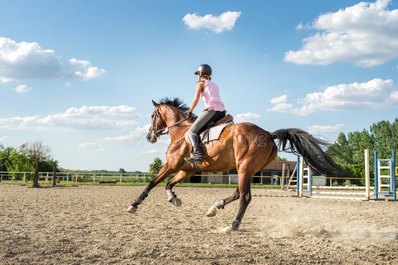 Woman riding a horse