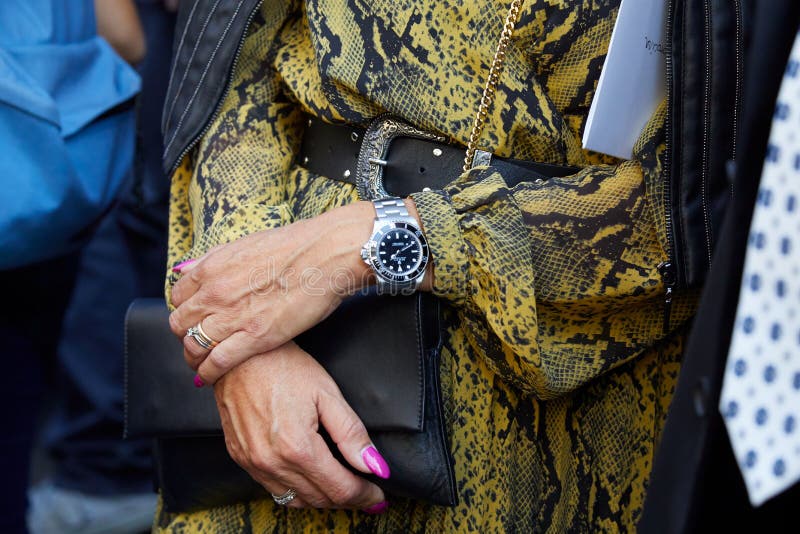 Woman Rolex Submariner Watch and Yellow Leather Design Dress before Ermanno Editorial Photography - Image of people, 194220752