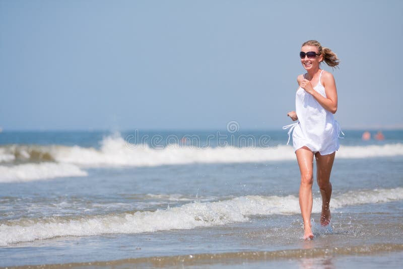 Woman running on the beach