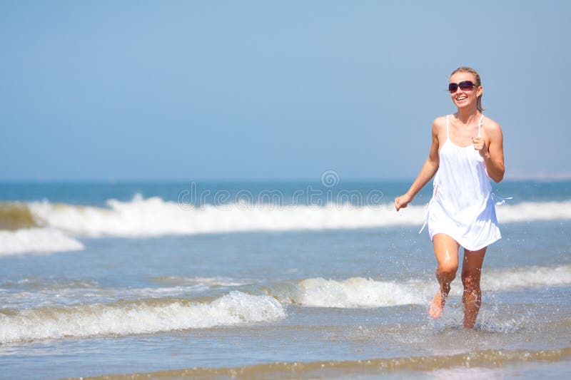 Woman running on the beach