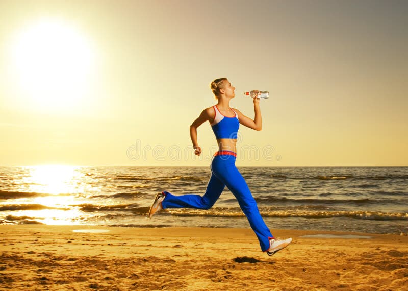 Woman running on a beach