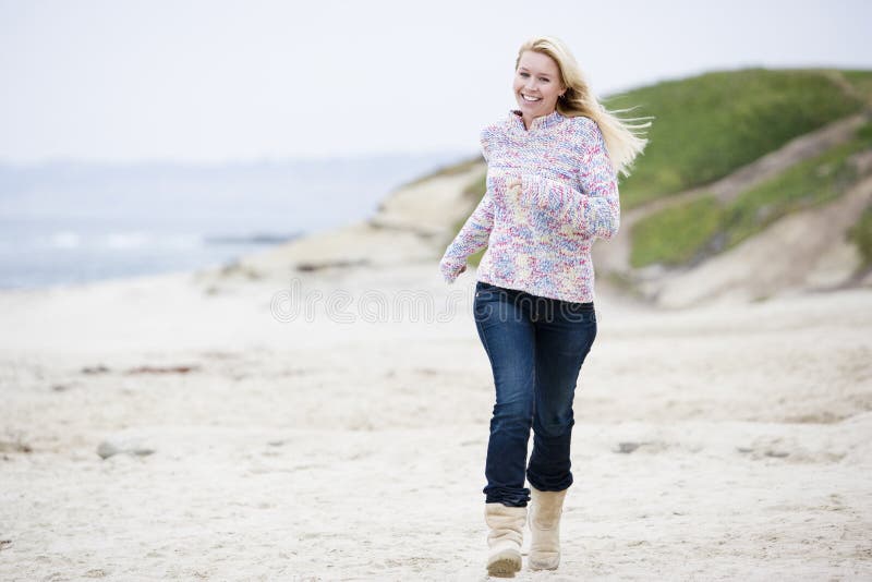 Woman running at beach royalty free stock photo Woman running at beach royalty free stock photo