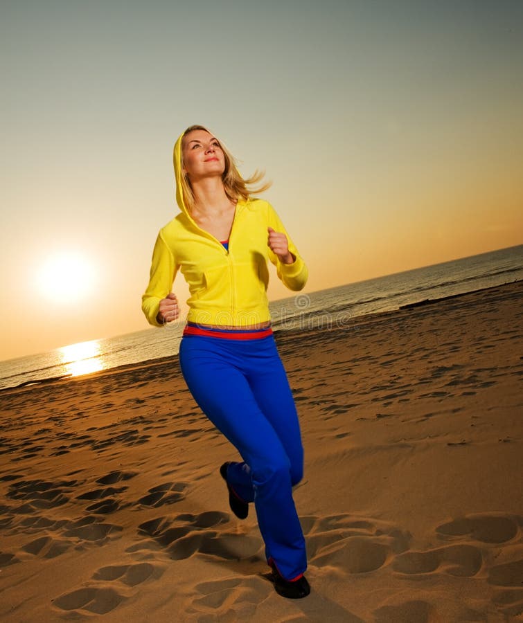 Woman running on a beach