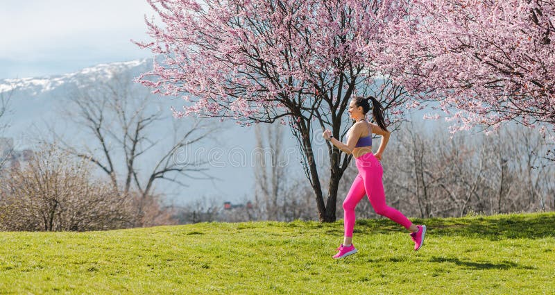 Woman running fast for sport on sunny day