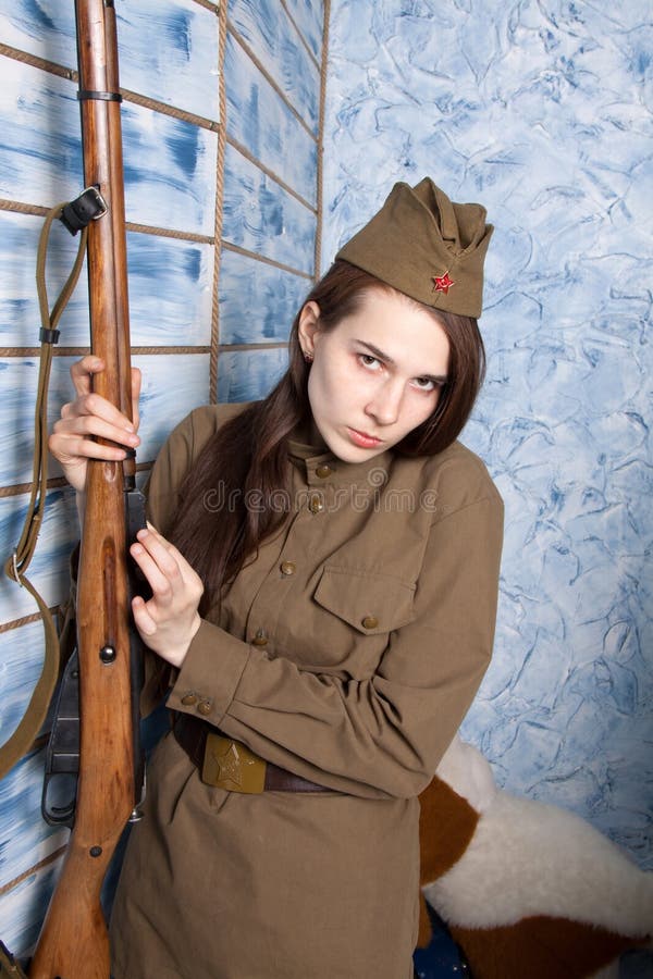 Woman in Russian Military Uniform with Rifle. Female Soldier during the ...