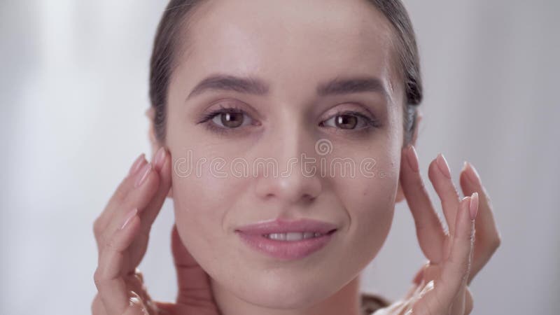 Woman S Face Care Smiling Female Touching Skin On Face Stock Footage