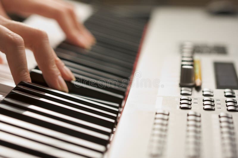 Woman s Fingers on Digital Piano Keys