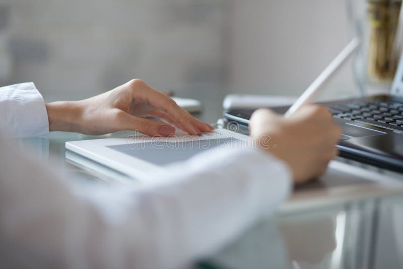 Woman`s hand drawing stock photos