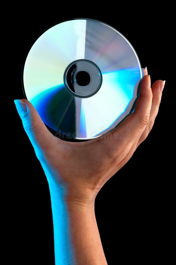 A woman s hand holding a compact disc