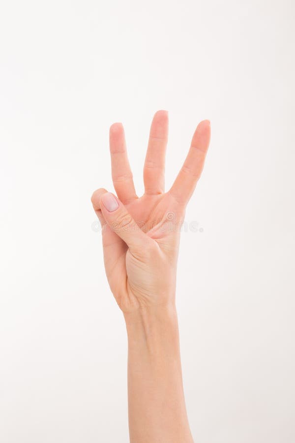 Woman's hand demonstrating three fingers over white background. Woman showing three ideas for your own future projects. Woman's hand demonstrating three fingers over white background. Woman showing three ideas for your own future projects.