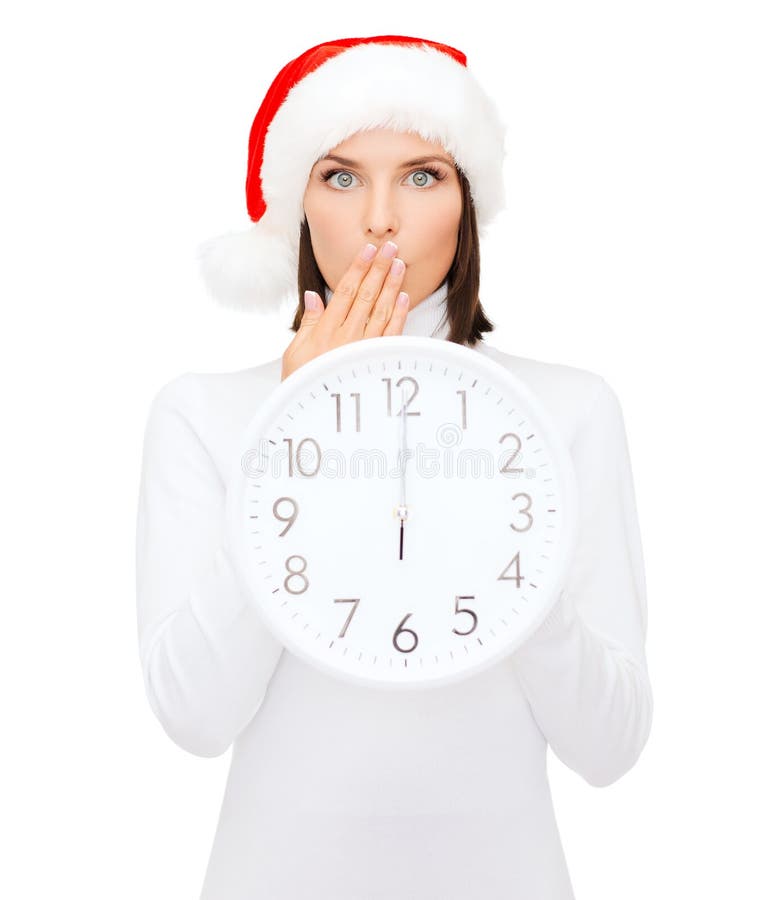 Woman in santa helper hat with clock showing 12