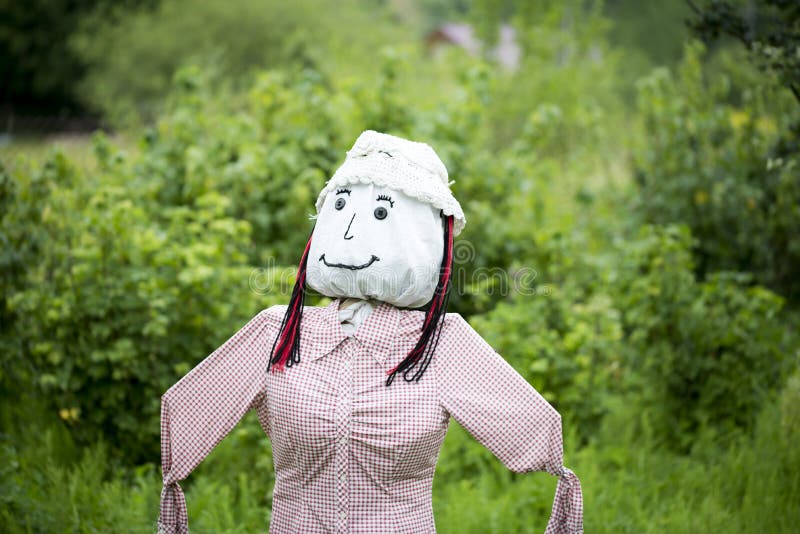 A woman scarecrow