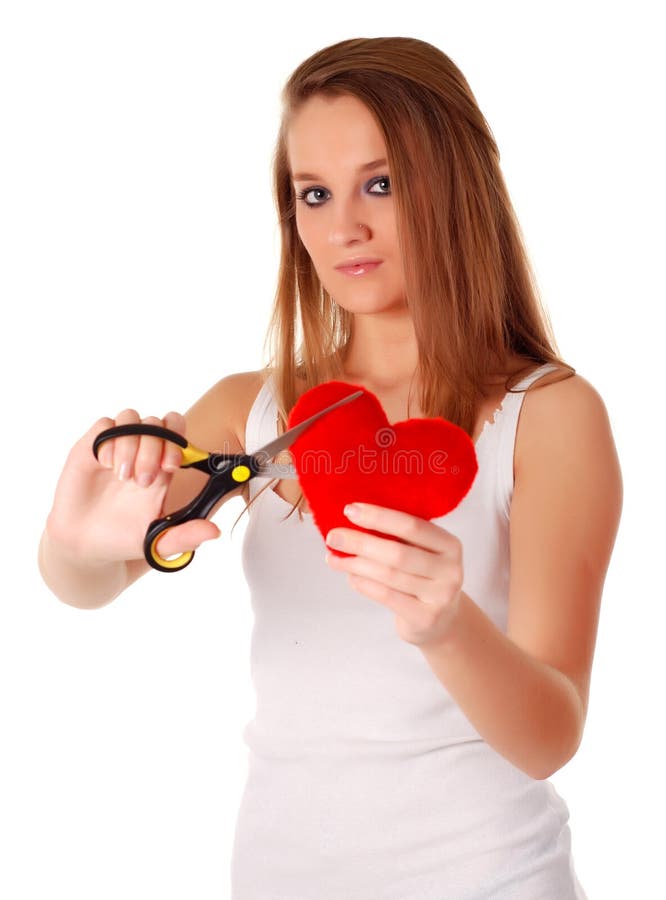 Woman with scissors and red heart