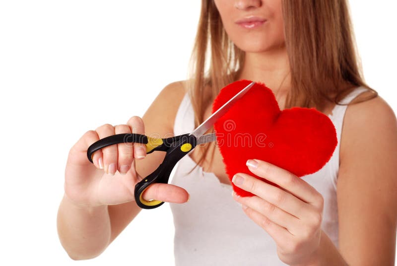 Woman with scissors and red heart