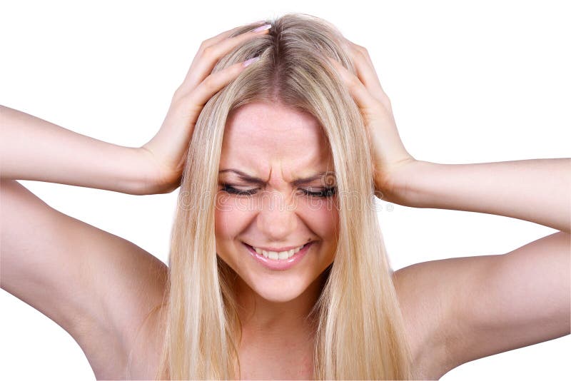 Woman screaming while covering her ears