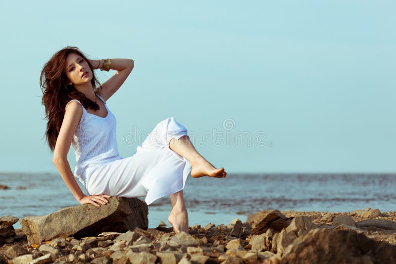 Woman on on the sea stock image