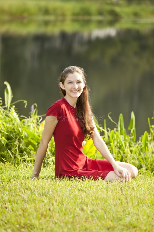 Woman seated on grass