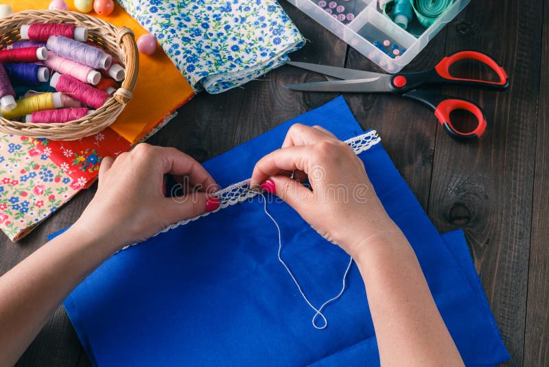 The Woman Sewing the Clothing. Stock Photo Image of asian, lady 73370208