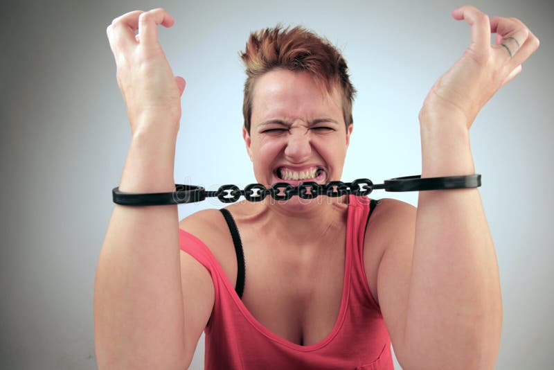 Attractive Young Woman Shackled In Chains Stock Photo, Picture and Royalty  Free Image. Image 5202772.