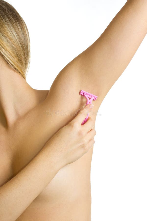 Woman shaving armpits