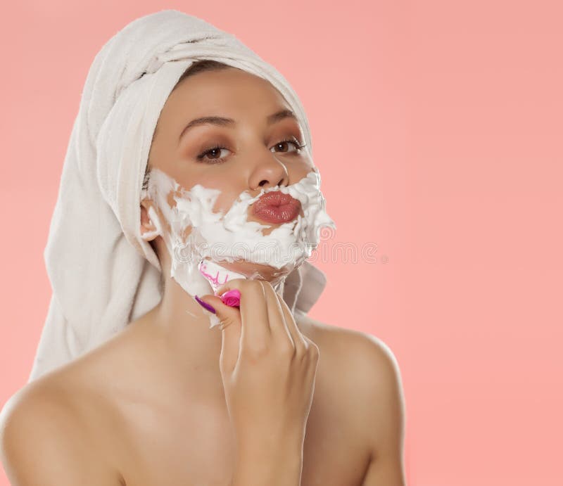 Woman shaving her face stock image. Image of funny, female 84478793