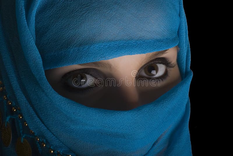 Woman with shawl on face