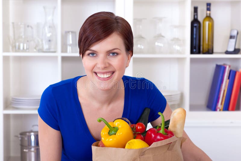 Woman with Shopping Bag in the Kitchen Stock Photo Image of adult
