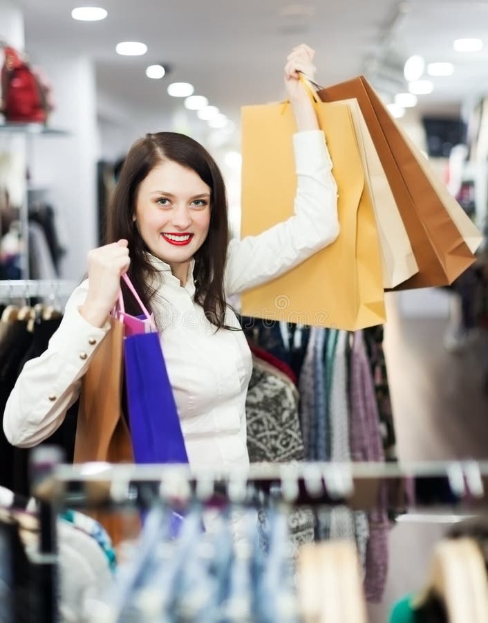 Woman with Shopping Bags at Store Stock Image - Image of hold, elegance ...