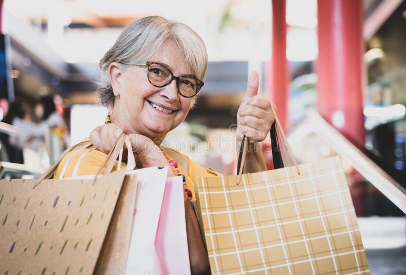 Youthful Senior Lady Shopping Stock Photos - Free & Royalty-Free Stock ...