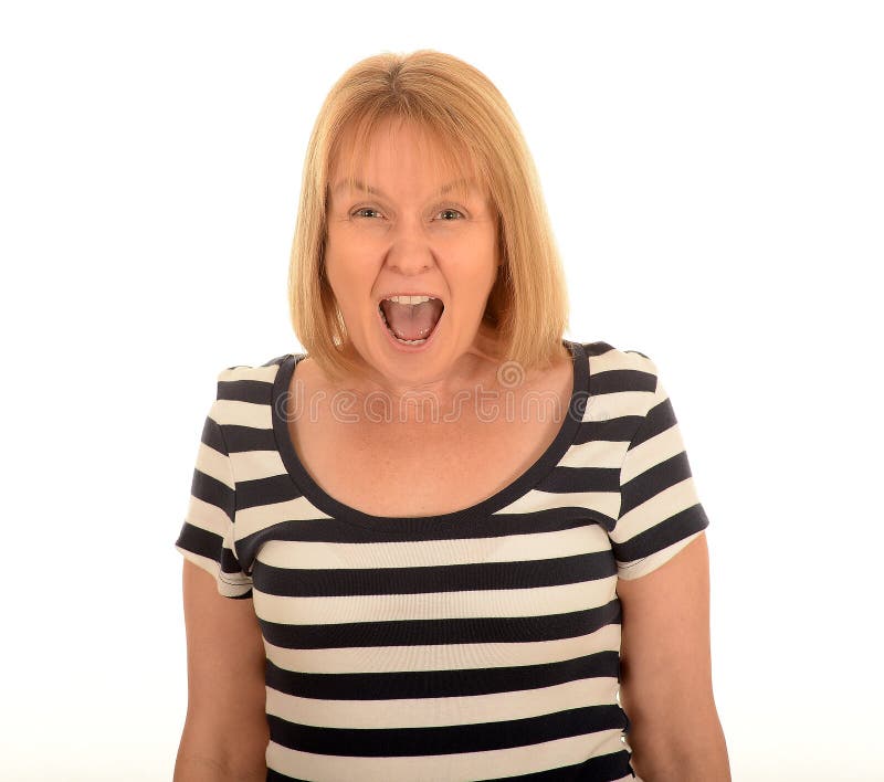 Portrait of a middle aged woman shouting with an open mouth.
