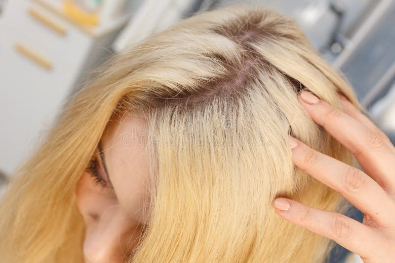 3. Short Blonde Hair with Visible Roots - wide 11