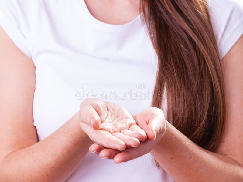 Woman showing her hands, holding something royalty free stock photos