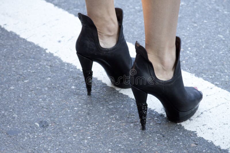 A Woman Showing Her High Heel Booties Stock Photo - Image of high ...