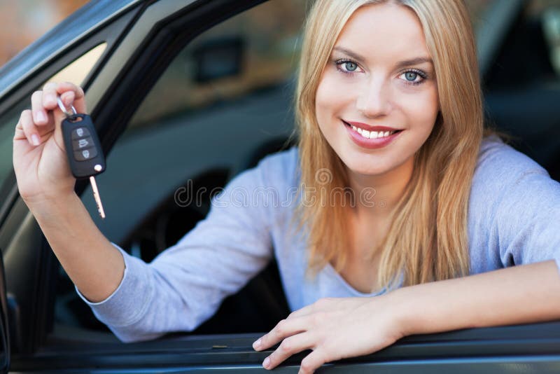 Woman Showing off New Car Keys. 