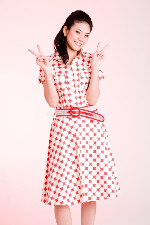 Woman showing peace sign