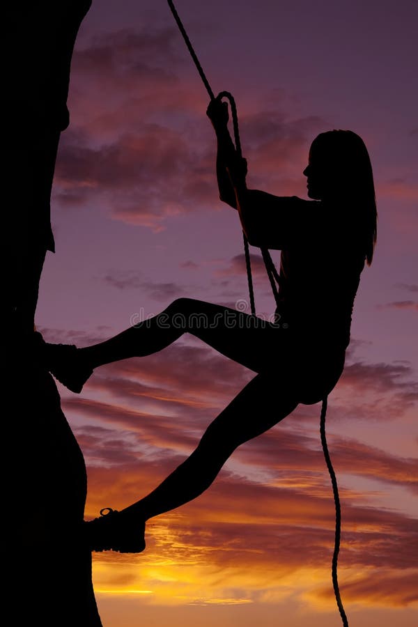 Woman Silhouette Climbing Rock Stock Photo Image of color, extreme