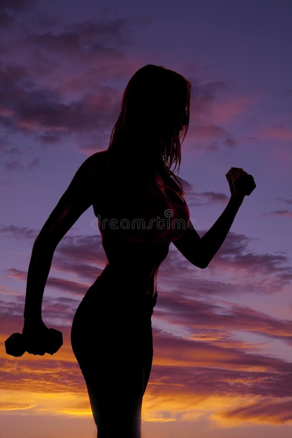 Woman silhouette weights stock images Woman silhouette weights stock images