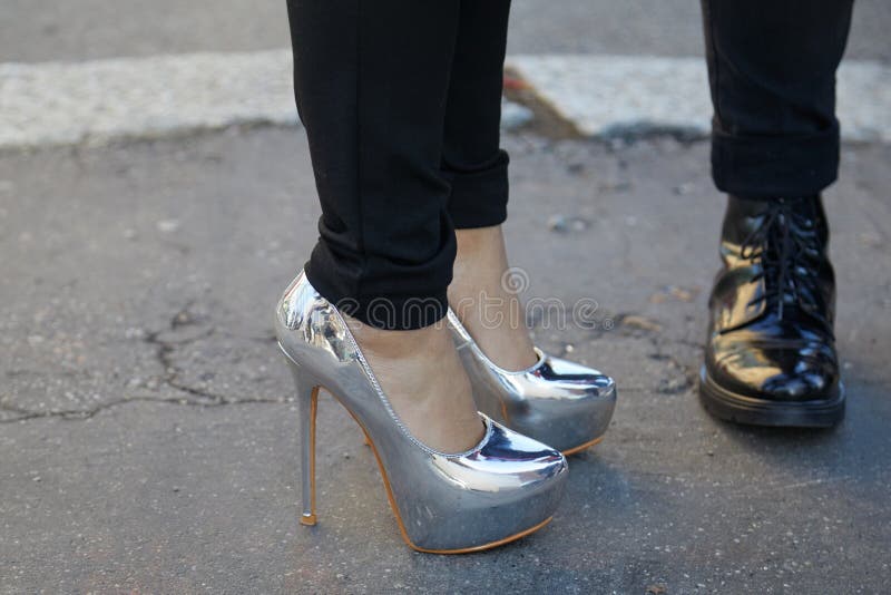 Details Of Womens Clothes And Shoes On A Street Stock Photo