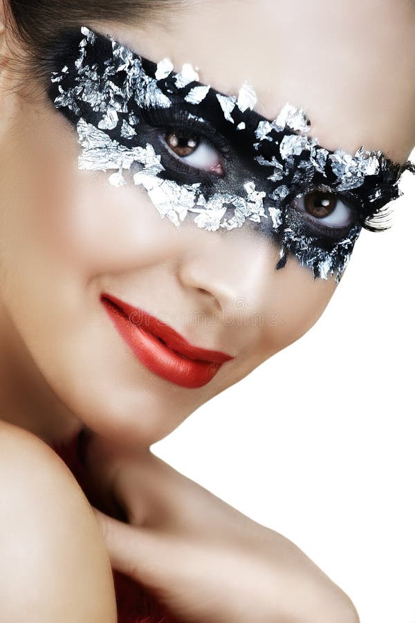 Woman in silver mask stock photo Woman in silver mask stock photo