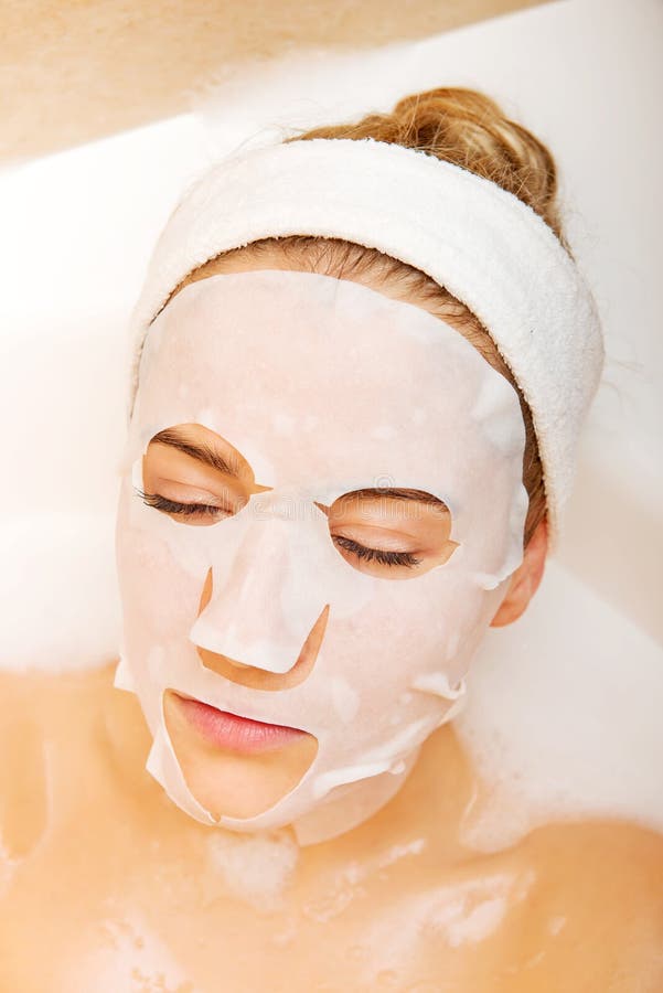 Woman Sitting in Bath with Face Mask Stock Image Image of caucasian