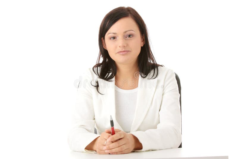 Woman sitting at the desk stock photos